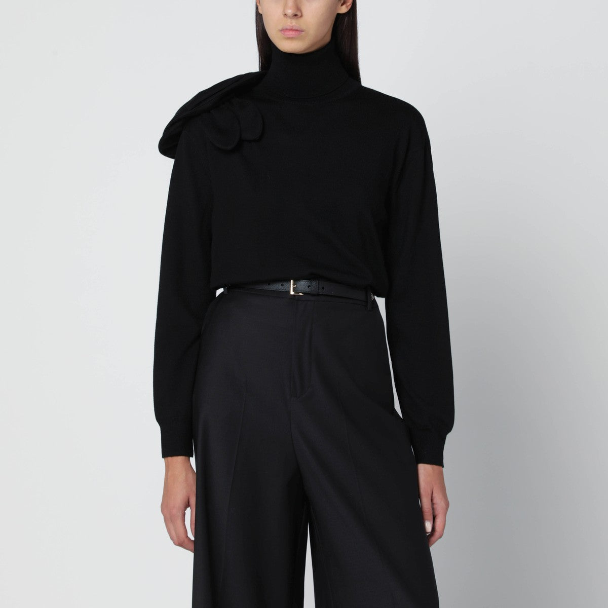 Moschino Black turtleneck sweater with flower detail Moschino