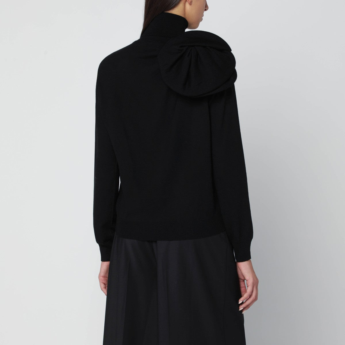 Moschino Black turtleneck sweater with flower detail Moschino