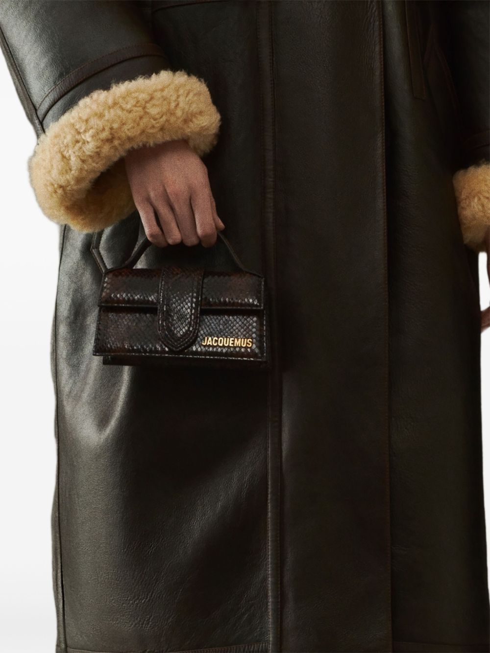 JACQUEMUS The Big Child Shoulder bag with flap. JACQUEMUS