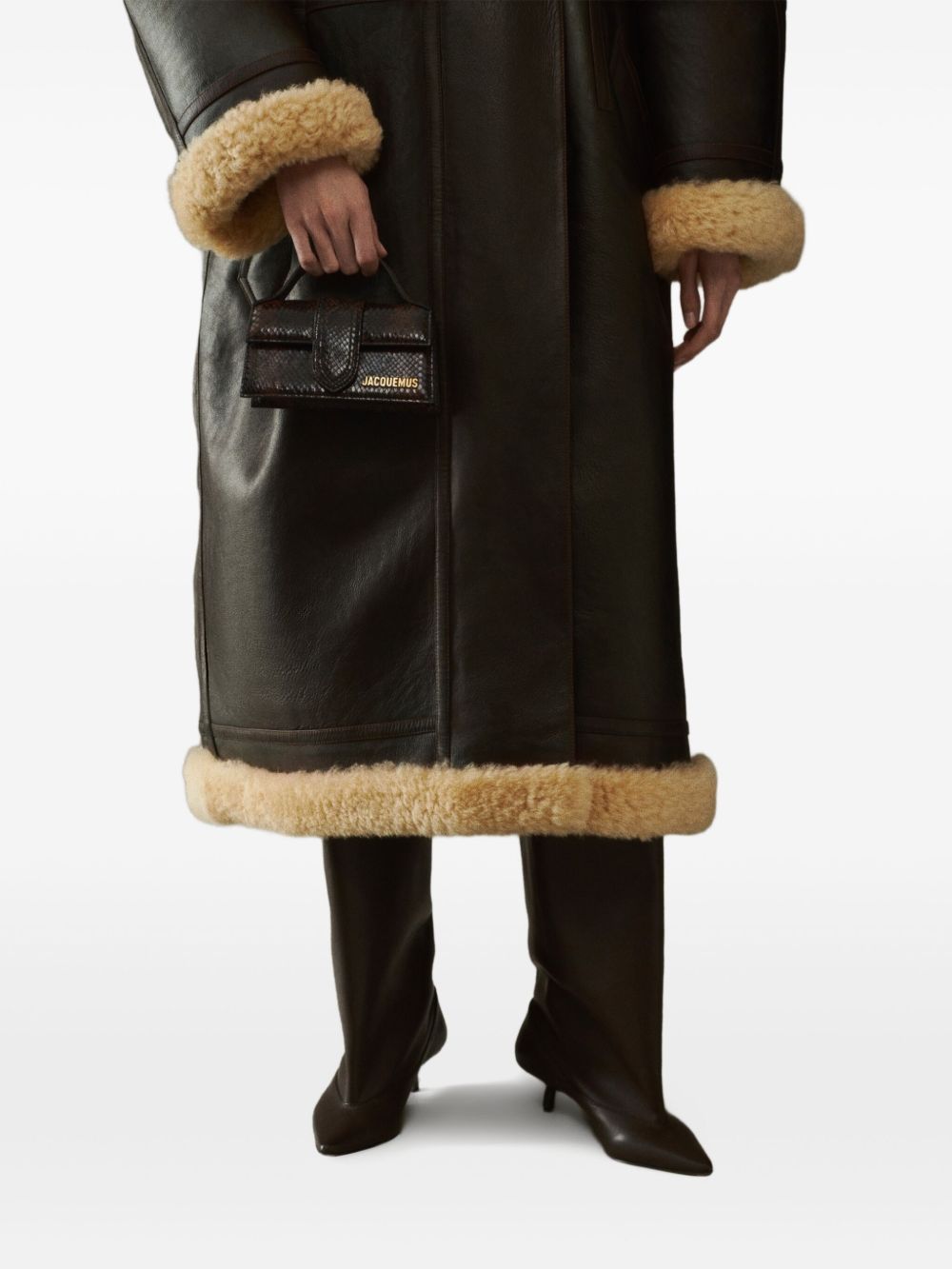 JACQUEMUS The Big Child Shoulder bag with flap. JACQUEMUS