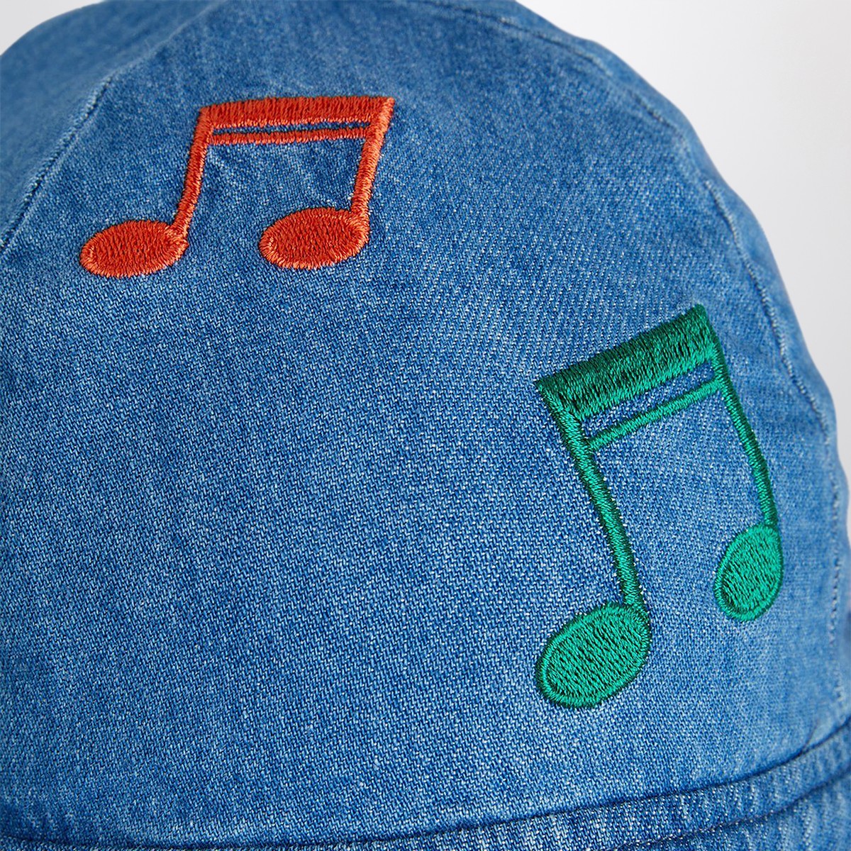 Mini Rodini Light blue denim hat with musical notes Mini Rodini