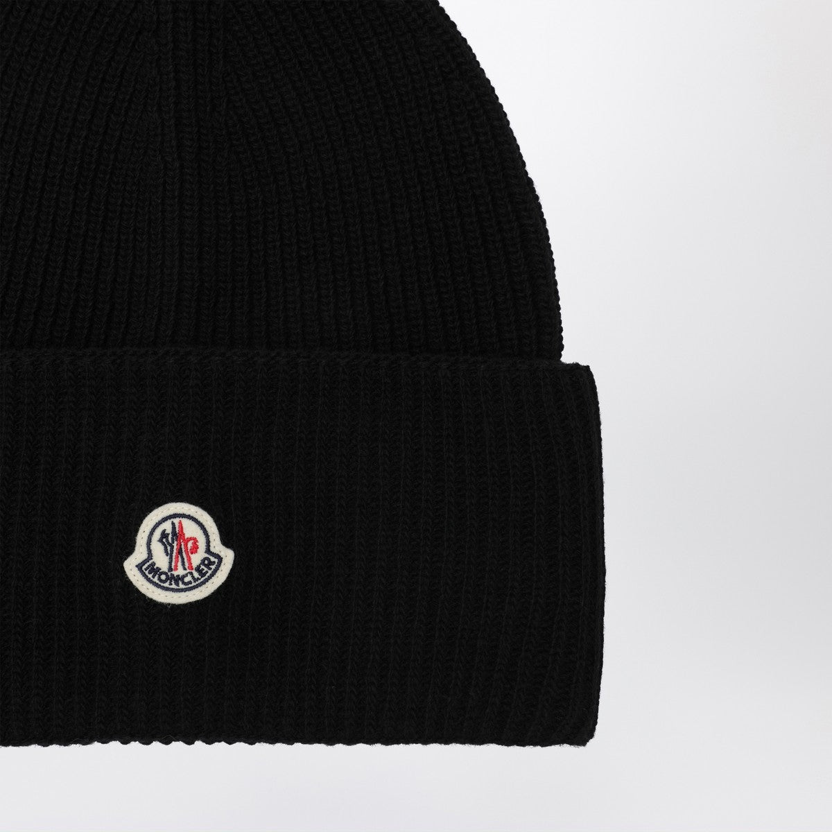 Moncler Black wool beanie with logo patch Moncler