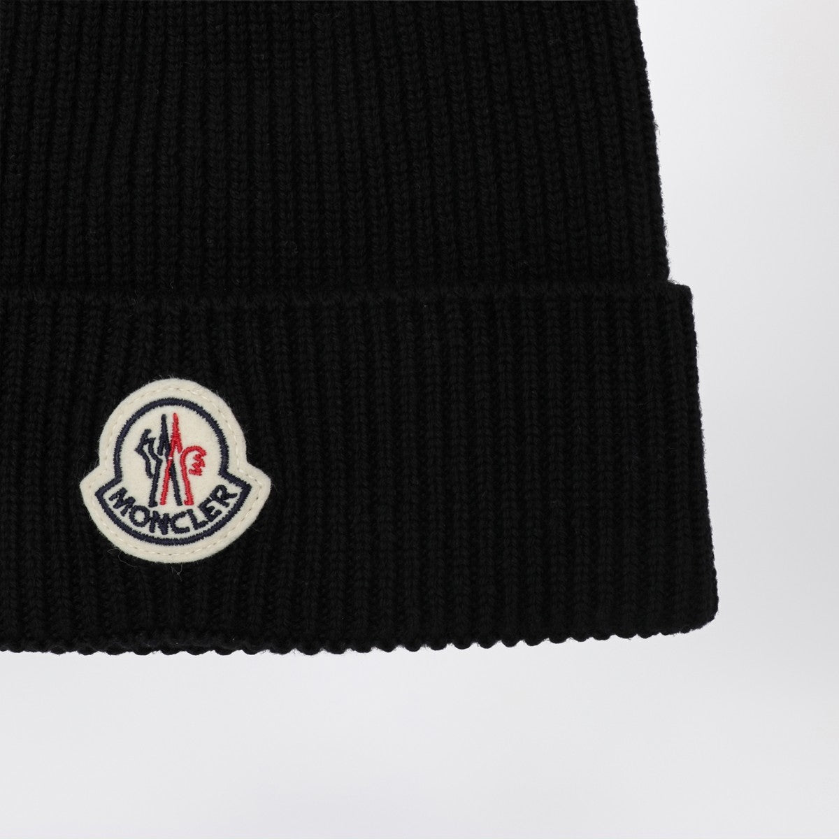 Moncler Black wool beanie with logo patch Moncler