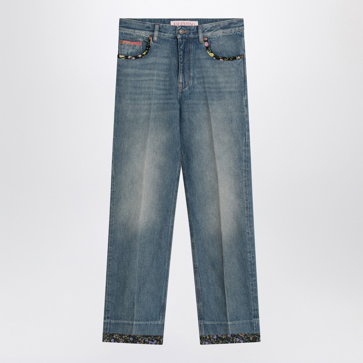 Valentino Washed blue jeans with floral fabric trims Valentino