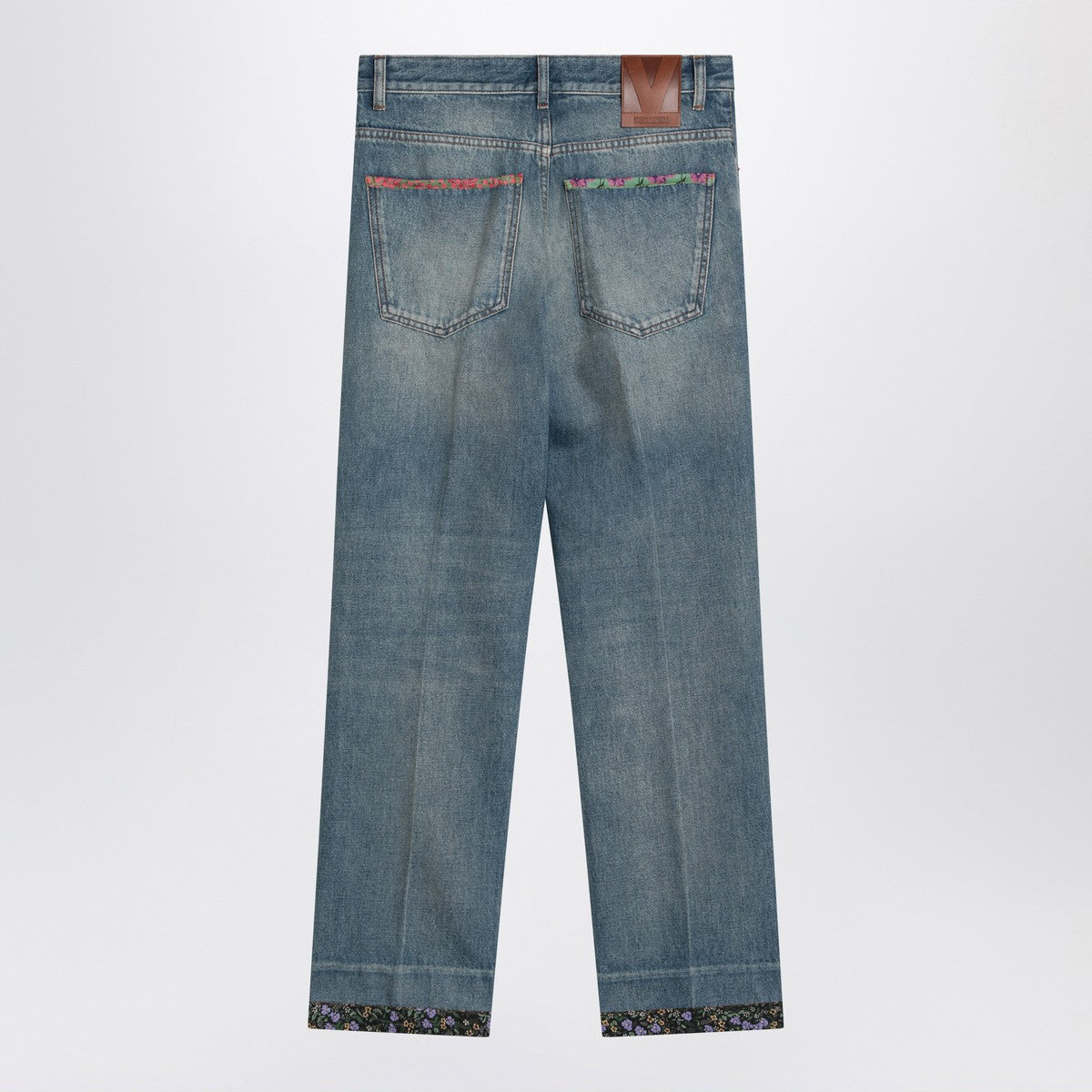 Valentino Washed blue jeans with floral fabric trims Valentino