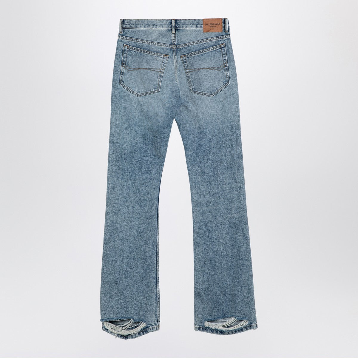 Balenciaga Light blue jeans with distressed hem Balenciaga