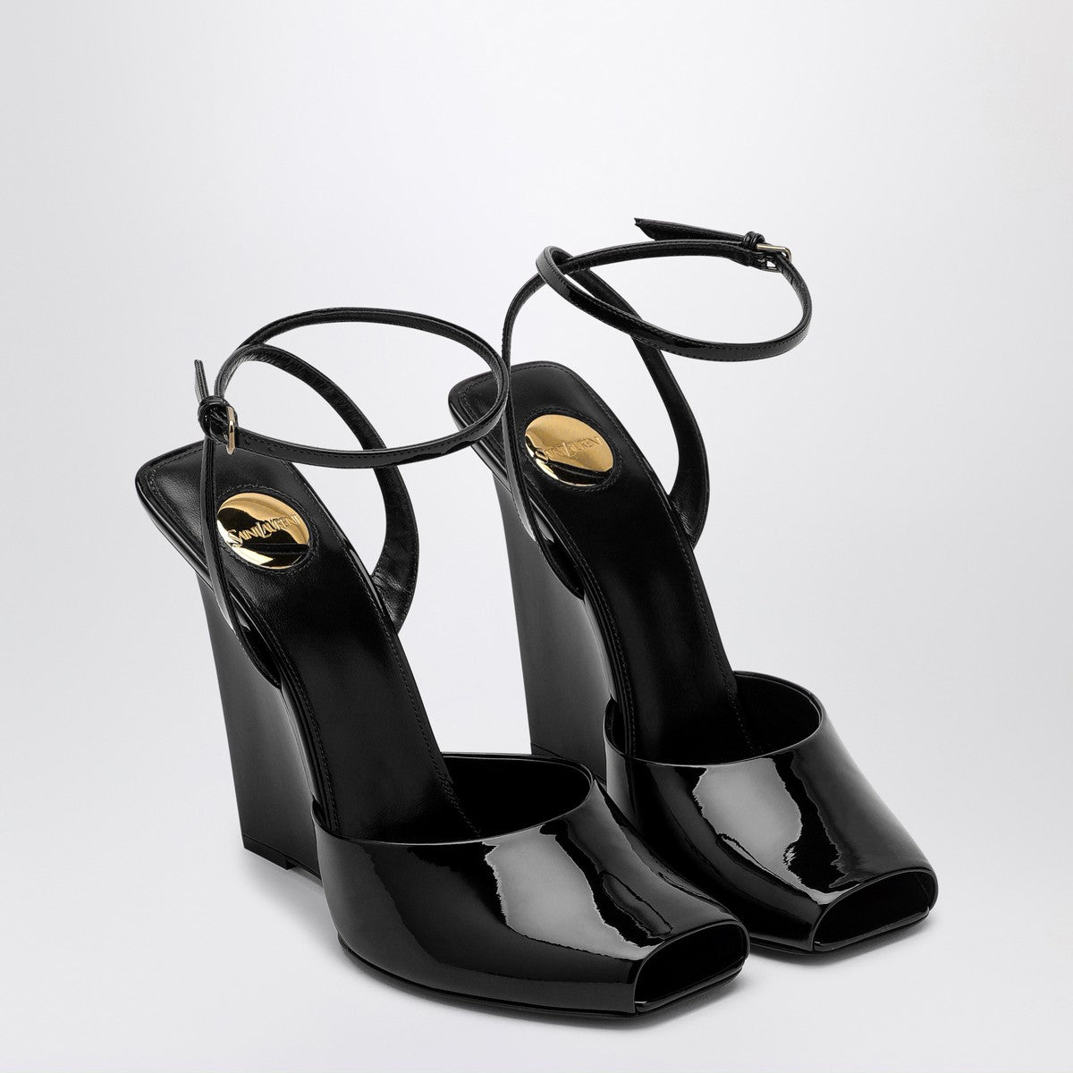Saint Laurent La Scandale wedge in black patent leather Saint Laurent