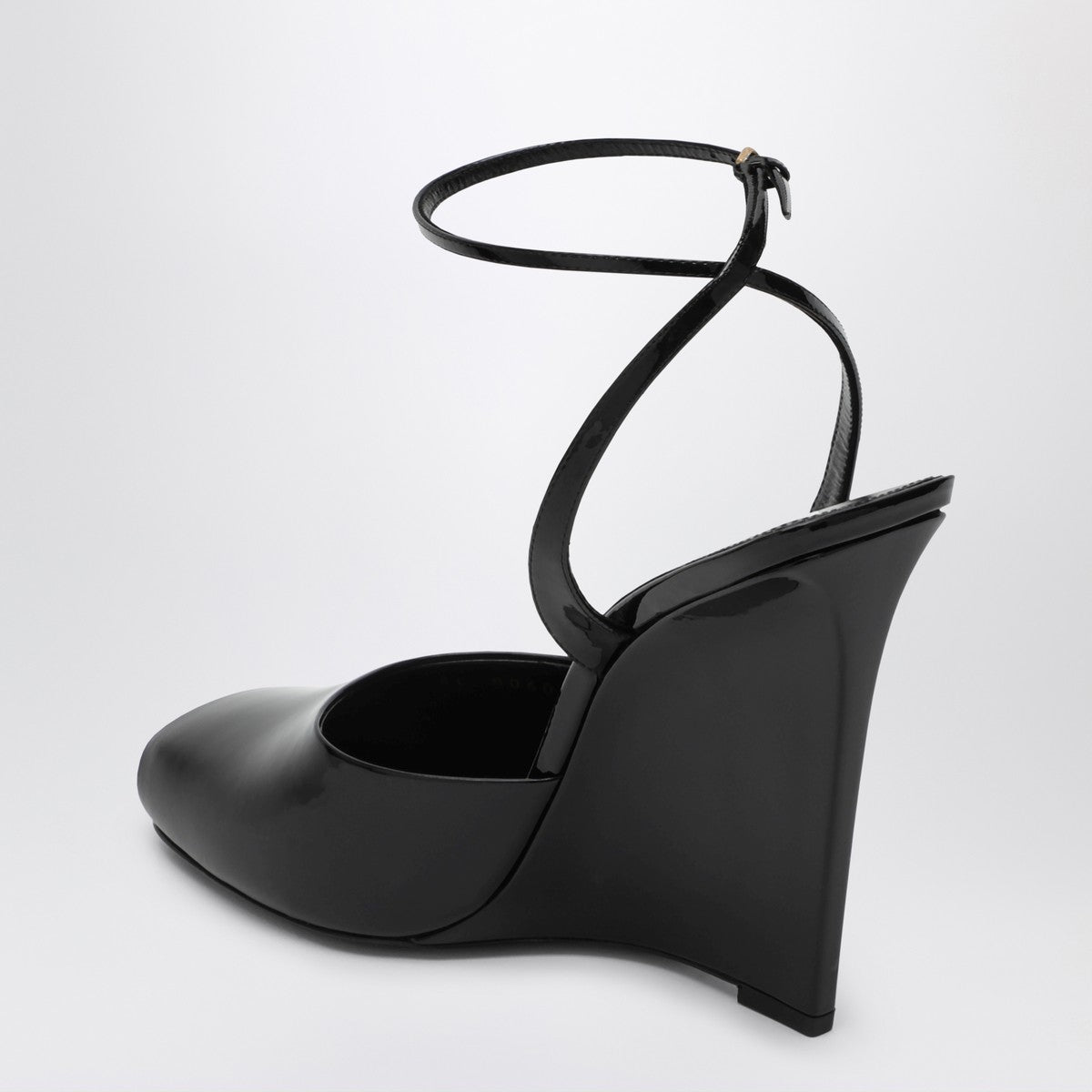 Saint Laurent La Scandale wedge in black patent leather Saint Laurent