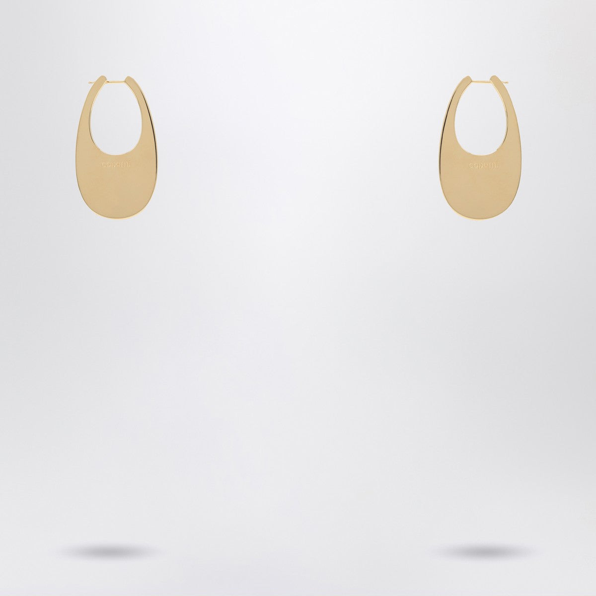 Coperni Large golden Swipe earrings Coperni