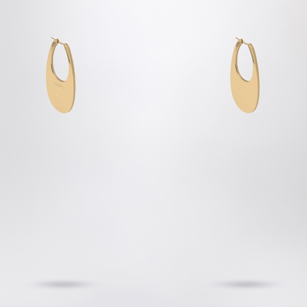 Coperni Large golden Swipe earrings Coperni
