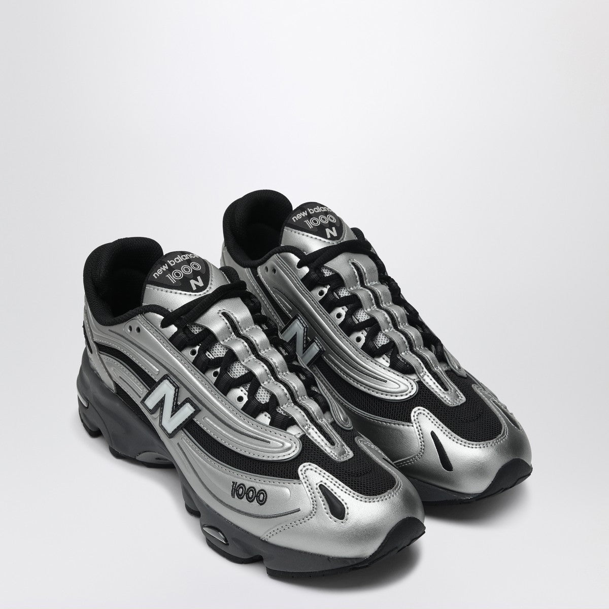 New Balance Sneakers 1000 SL in metallic silver leather New Balance