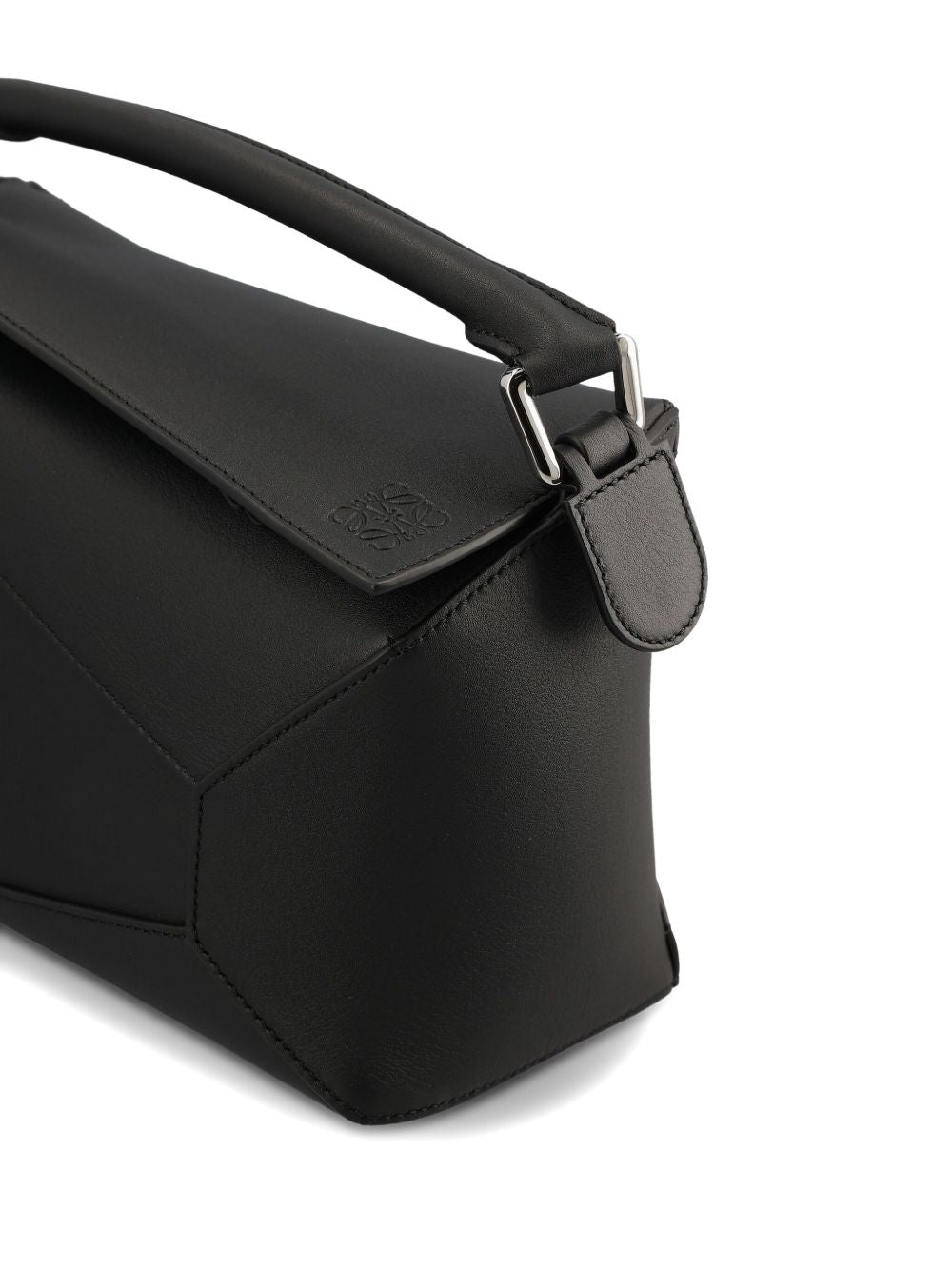 PUZZLE EDGE SMALL LEATHER HANDBAG