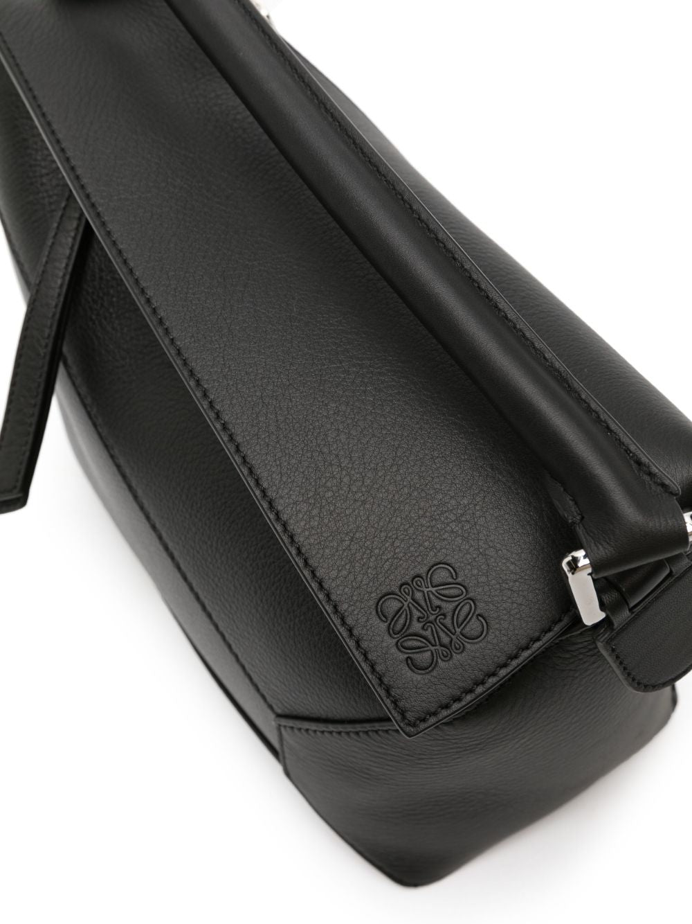 PUZZLE EDGE SMALL LEATHER HANDBAG