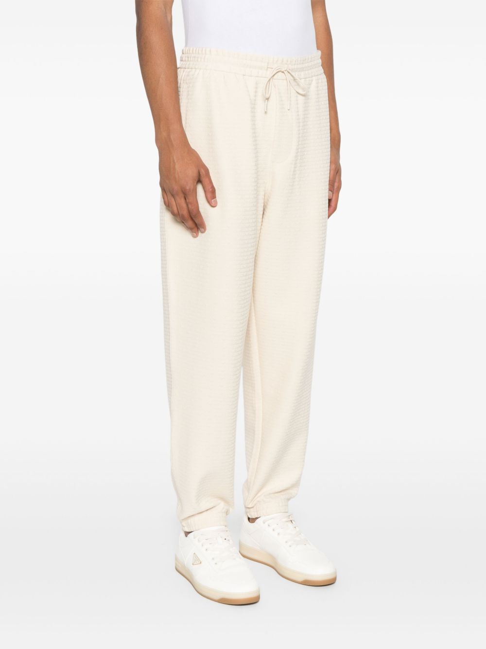 Emporio Armani ASV Lyocell blend jersey joggers with all-over lettering Emporio Armani 