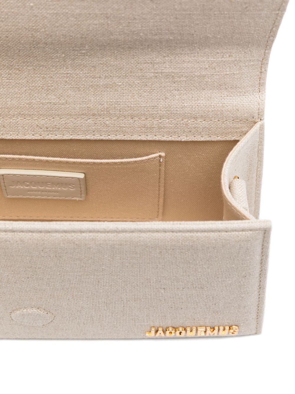 JACQUEMUS The Big Child Shoulder bag with flap. JACQUEMUS