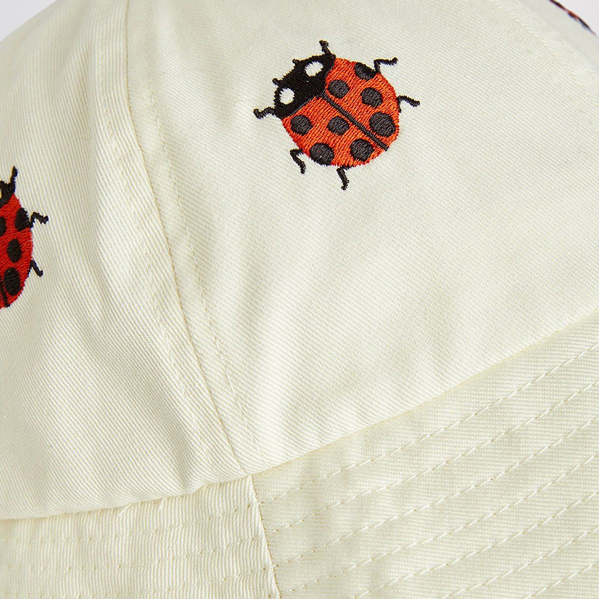 Mini Rodini White hat with ladybugs Mini Rodini 