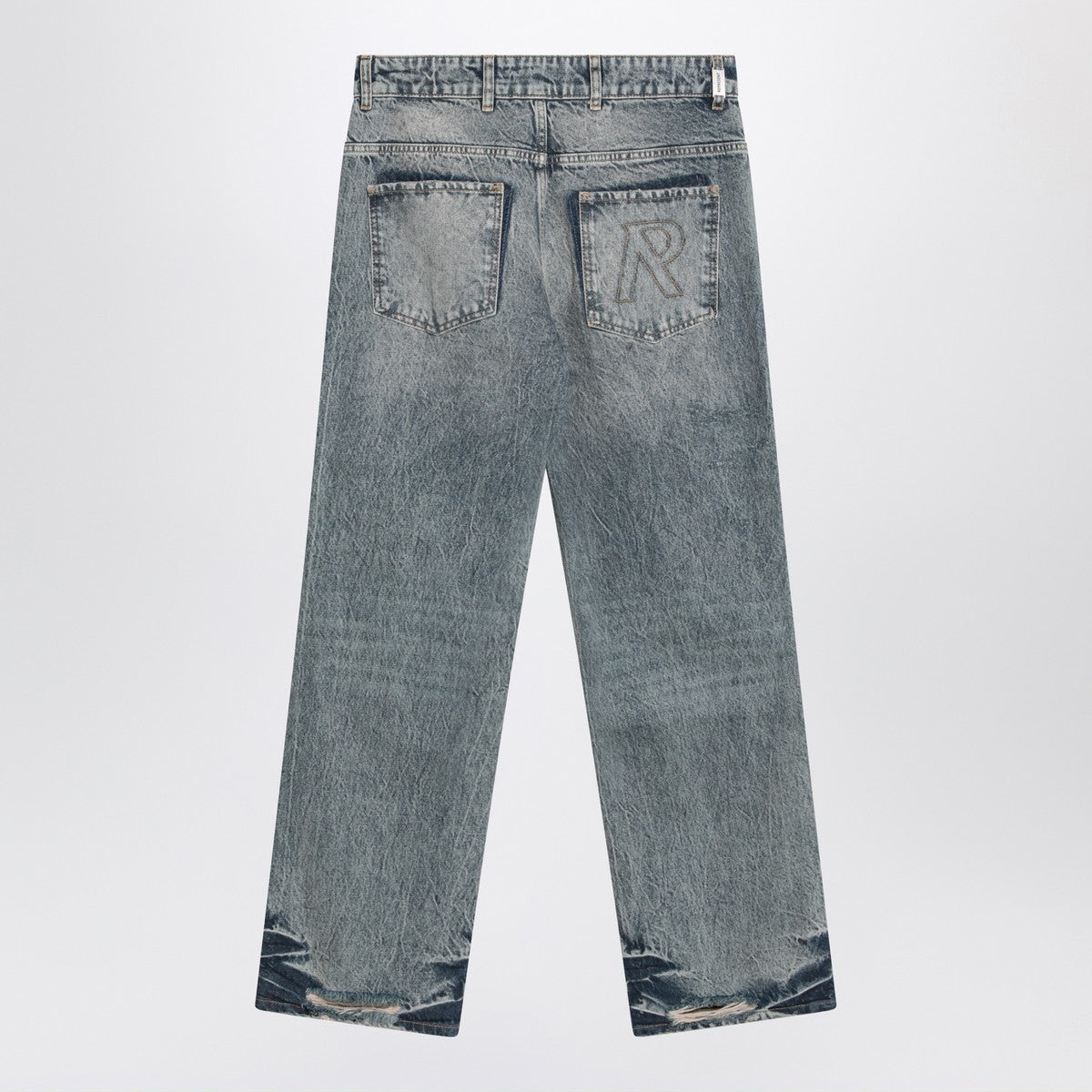 Represent Washed blue jeans with rips Represent 